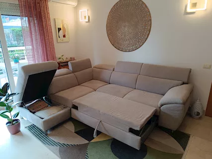 Divano angolare con letto/poggiapiedi estraibile