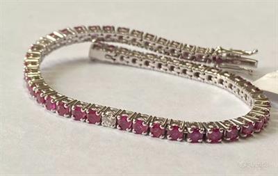 BRACCIALE TENNIS ORO 18kt. RUBINI BIRMANI