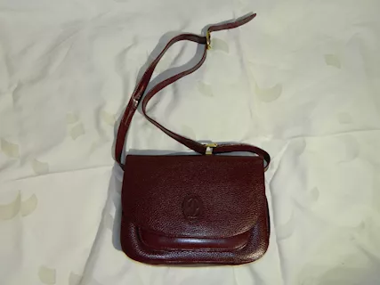 Borsa Must de Cartier in pelle bordeaux