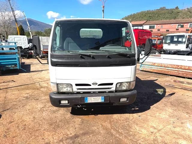 Foto 2Camion Marca Nissan Cabstar 35.12 ribaltabile Anno 2002 Km 233000