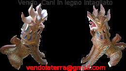 Cani in legno intagliato
