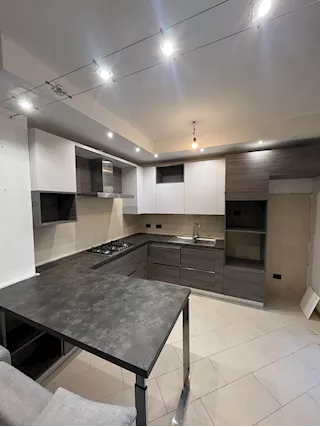 Cucina ad L con penisola snack