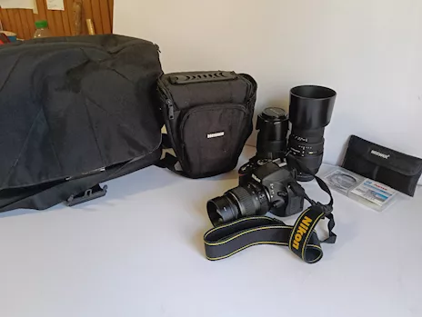 Nikon D5100 con tre obiettivi, filtri e borse