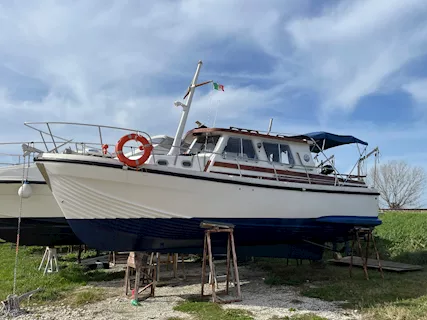 Pilotina cabinato a motore