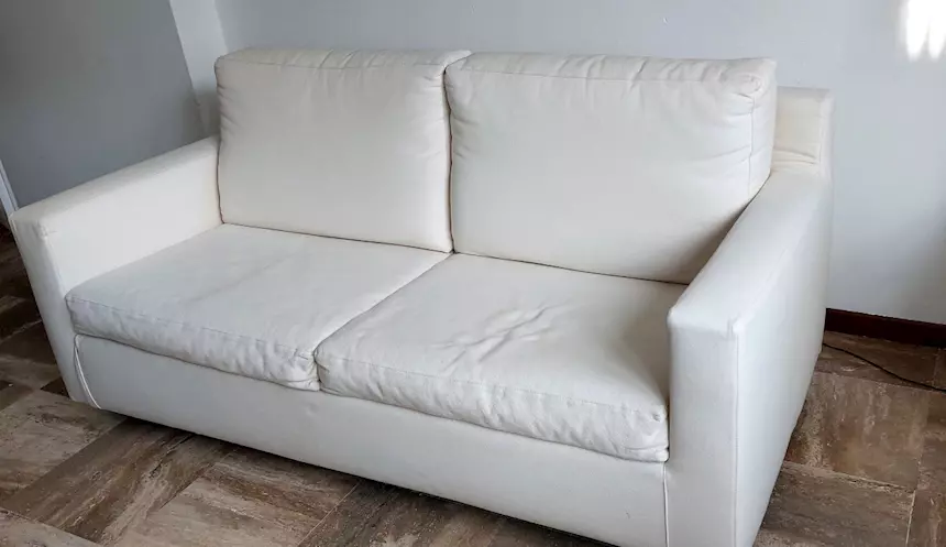 Divano letto, color bianco crema