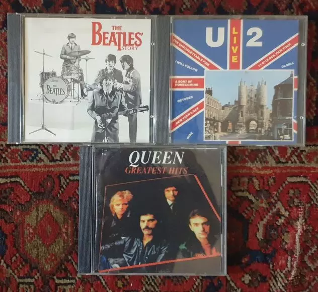 CD The Beatles Story - Queen Greatest Hits - U2 live Bologna