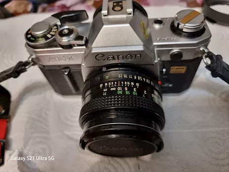 Canon con vari obiettivi e riduttore