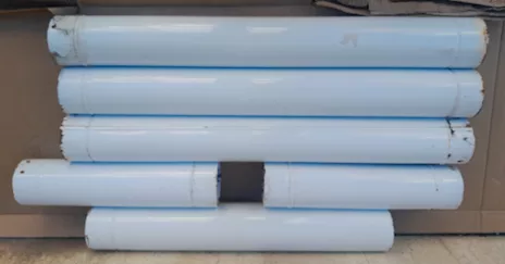 Tubi per stufa a legna. Curva porcellanata pieghettata bianca