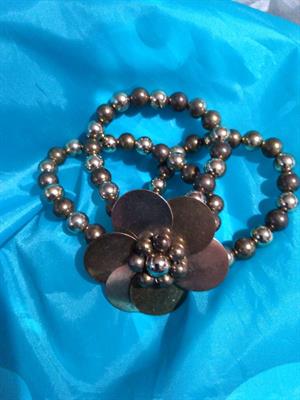 Bigiotteria vintage 3 bracciali fermati da un fiore