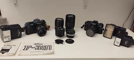 Minolta e Nikon: Macchine Fotografiche a Pellicola e Materia