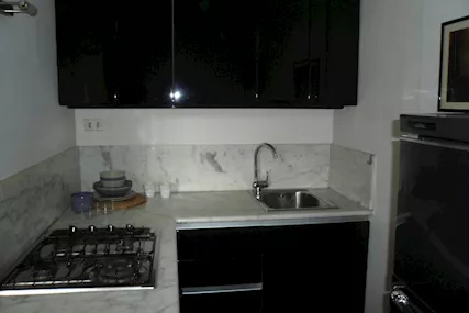 Cucina ad Angolo Nera Laccato Lucido