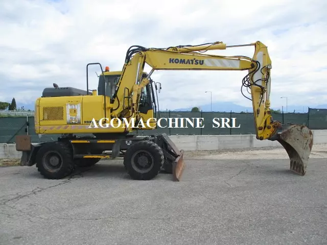 Foto 6KOMATSU PW140-7 Tipologia Escavatore, peso 16.000 kg