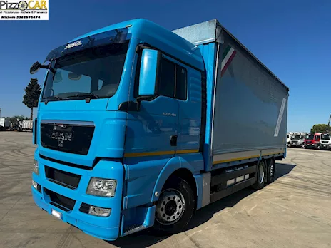 Man TGX 26.480 centinato e rimorchio biga