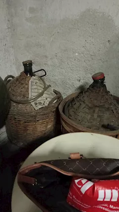 Damigiana 50 litri e contenitori di olio