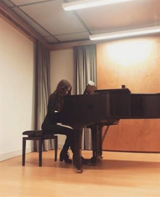 Laureata in pianoforte