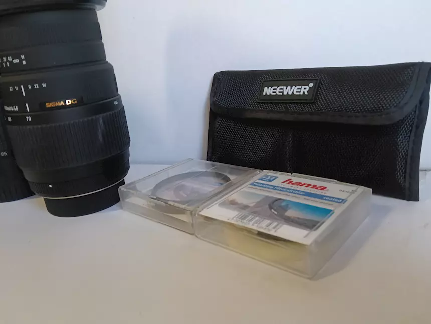 Foto 5Nikon D5100 con tre obiettivi, filtri e borse, come nuova