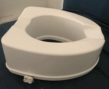 Rialzo WC con fissaggio laterale ad altezza 14 cm