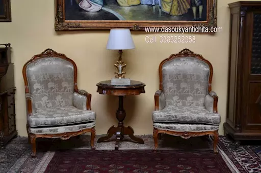 Coppia di poltrone-bergère in noce stile Luigi XV