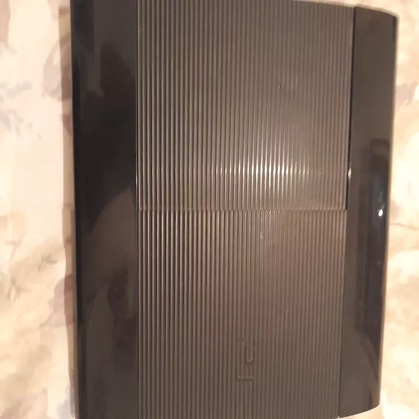 Console PlayStation 3 Super Slim + 12 giochi + controller