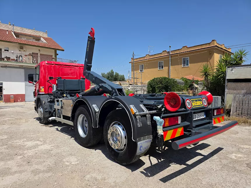 Foto 4Scania 94D scarrabile + caricatore ragno Anno 2001