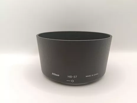 Paraluce Nikon HB-37, adatto x 55-200mm f/4-5.6G