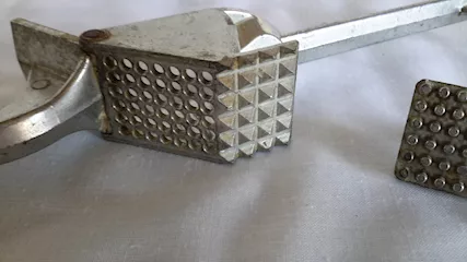 Schiaccia aglio e batticarne