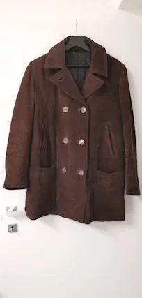 Cappotto in pelle con borsa