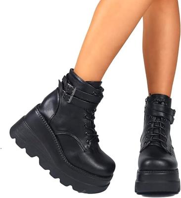 Stivaletti/anfibi da donna in pelle con plateau e tacc