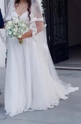 Abito da sposa in pizzo e chiffon