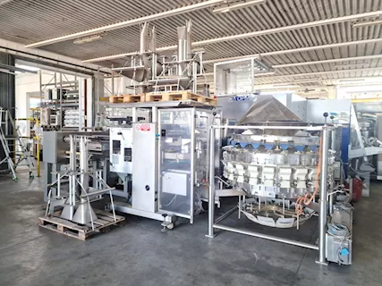 Imbustatrice verticale con multiteste